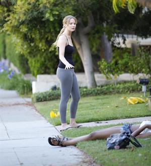 Jennifer Lawrence in Santa Monica helping a woman who fainted on June 25, 2012 