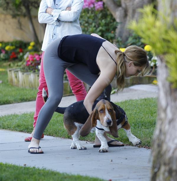 Jennifer Lawrence in Santa Monica helping a woman who fainted on June 25, 2012 