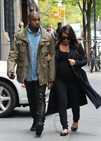 Kim Kardashian Takes an early morning stroll with Kanye West in SoHo (May 6, 2013) 