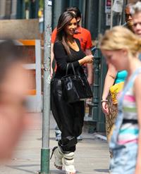 Kim Kardashian and Kanye West walk around SoHo in New York City 