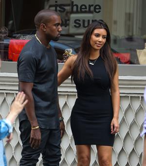 Kim Kardashian and Kanye West walk around SoHo in New York City 