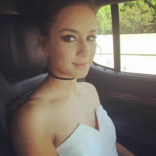 Troian Bellisario taking a selfie