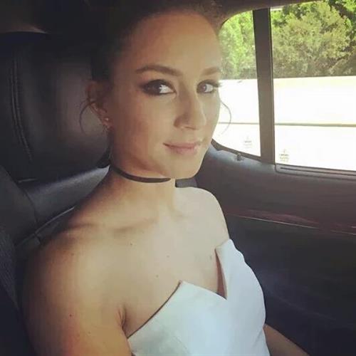 Troian Bellisario taking a selfie