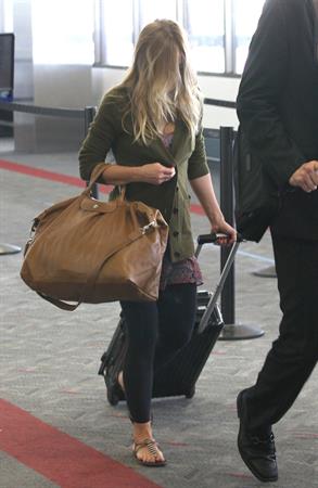 Kristen Bell - Departing on a flight at LAX - August 21, 2012