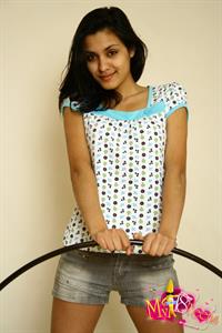 Belinda A nude on white shag carpet