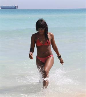 Alexandra Burke bikini candids Miami March 7, 2011 