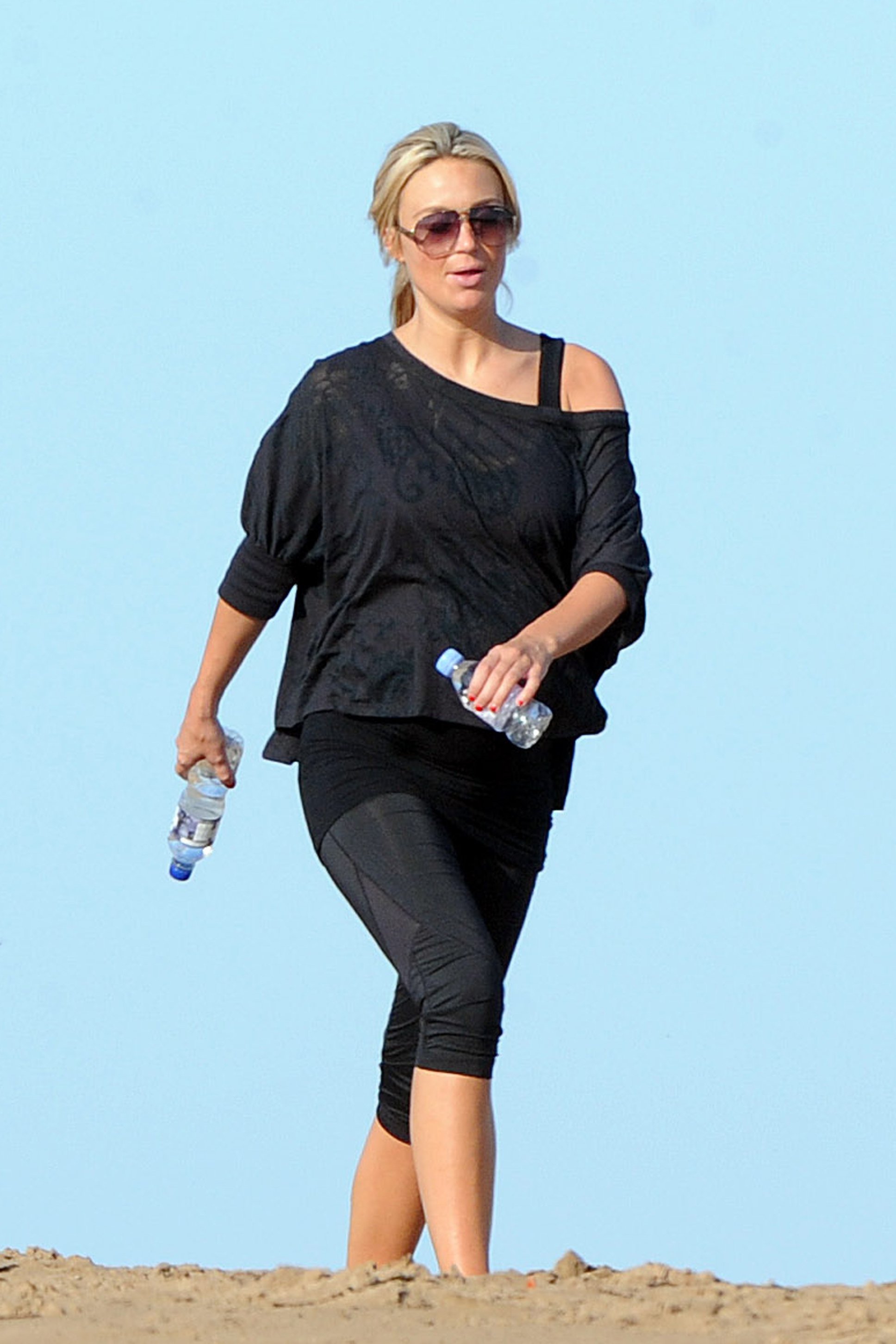 Alex Curran - Personal training session on a beach on September 19, 2011
