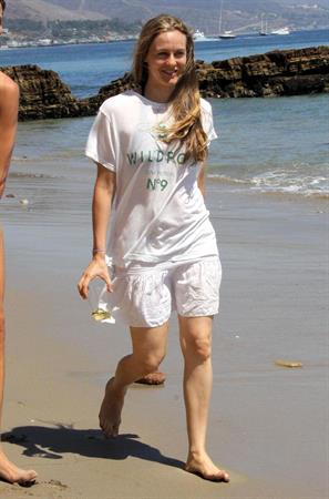 Alicia Silverstone walking on the beach in Malibu 