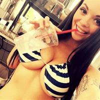 Anonymous in a bikini taking a selfie