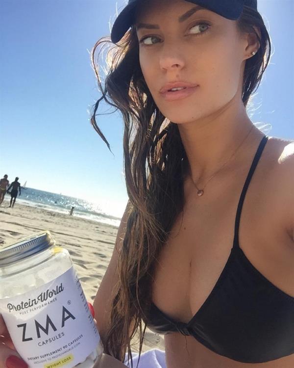 Hannah Stocking in a bikini taking a selfie