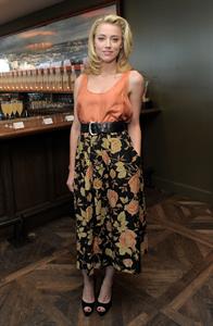 Amber Heard Belvedere Vodka and Krista Smith toast Vanity Fair's June 2011 Vanities in West Hollywood on May 14, 2011