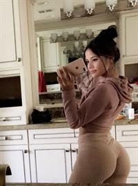 Katya Elise Henry taking a selfie and - ass