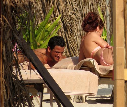 Amy Childs sunbathing with Peter Andre in Dubai on January 3, 2012