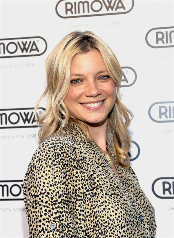 Amy Smart Rimowa New Rodeo Drive store opening party in Beverly Hills on May 16, 2011