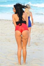 Nabilla Benattia in a bikini - ass
