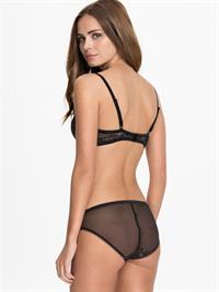 Xenia Deli in lingerie - ass