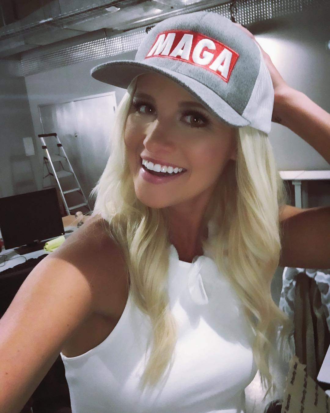 Tomi Lahren taking a selfie