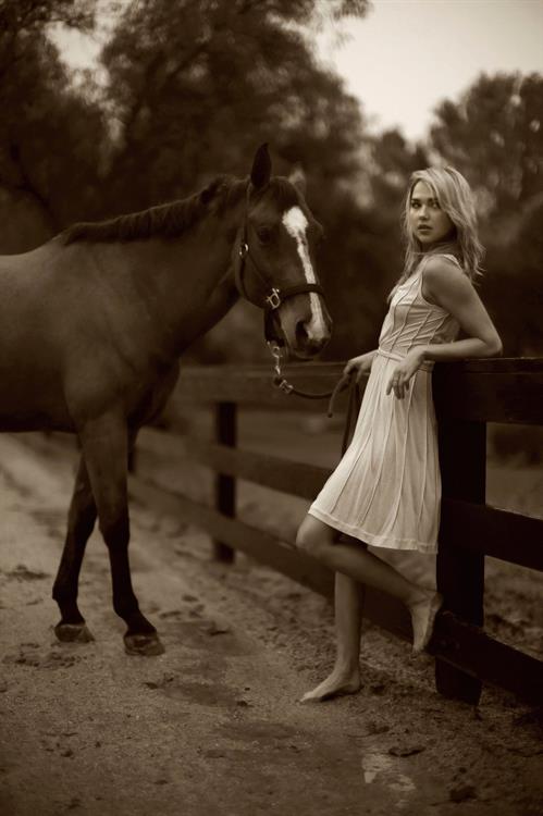 Arielle Kebbel pays tribute to her 1200 pound baby Pacific Breeze during a portrait session Los Angeles 