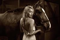 Arielle Kebbel pays tribute to her 1200 pound baby Pacific Breeze during a portrait session Los Angeles 