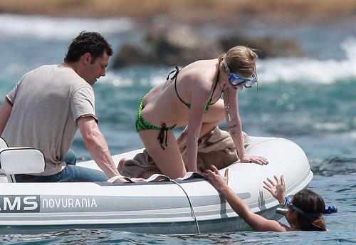 Avril Lavigne in a green bikini in Cabo, Mexico on July 27, 2012