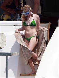 Avril Lavigne in a green bikini in Cabo, Mexico on July 27, 2012