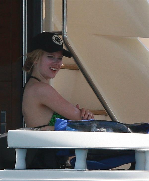 Avril Lavigne in a green bikini in Cabo, Mexico on July 27, 2012