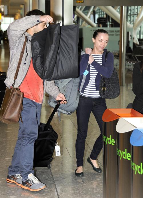 Christina Ricci With her boyfriend fly out of Heathrow Airport in London to NY - June 12, 2012