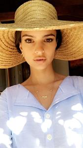 Emily Ratajkowski taking a selfie