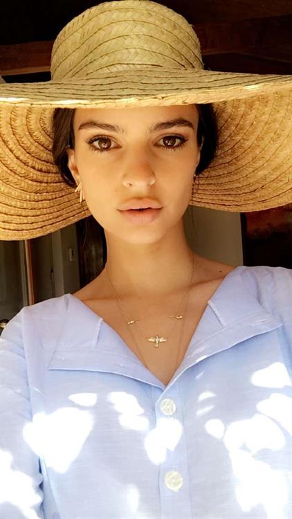 Emily Ratajkowski taking a selfie