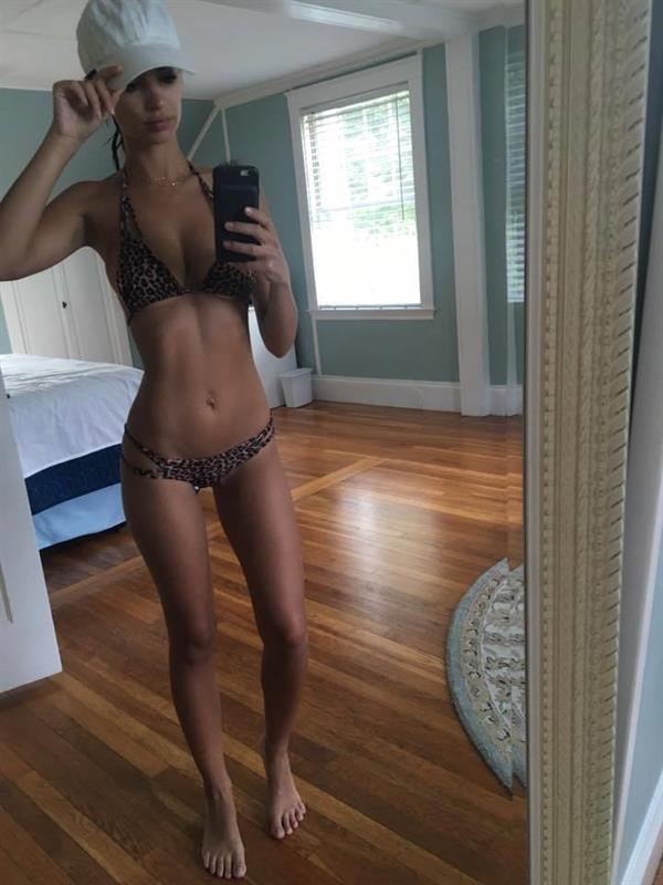 Emily Ratajkowski in a bikini taking a selfie