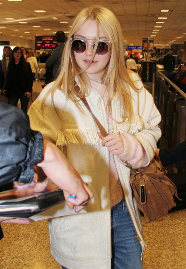 Dakota Fanning arriving in Salt Lake City to attend the Sundance Film Festival 1/21/13 
