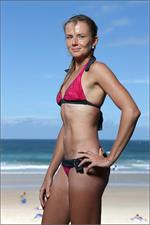 Daniela Hantuchova bikini beach surfing candids in Brisbane, Australia, December 26, 2012 