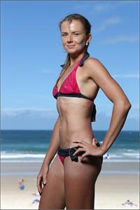 Daniela Hantuchova bikini beach surfing candids in Brisbane, Australia, December 26, 2012 