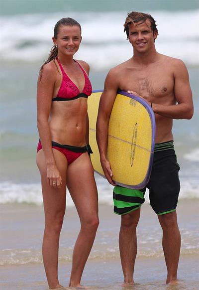 Daniela Hantuchova bikini beach surfing candids in Brisbane, Australia, December 26, 2012 