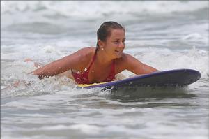 Daniela Hantuchova bikini beach surfing candids in Brisbane, Australia, December 26, 2012 