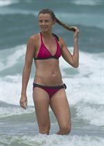 Daniela Hantuchova bikini beach surfing candids in Brisbane, Australia, December 26, 2012 