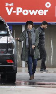 Dannii Minogue - Pictured getting a little wet while filling up on petrol - 09th August 2012
