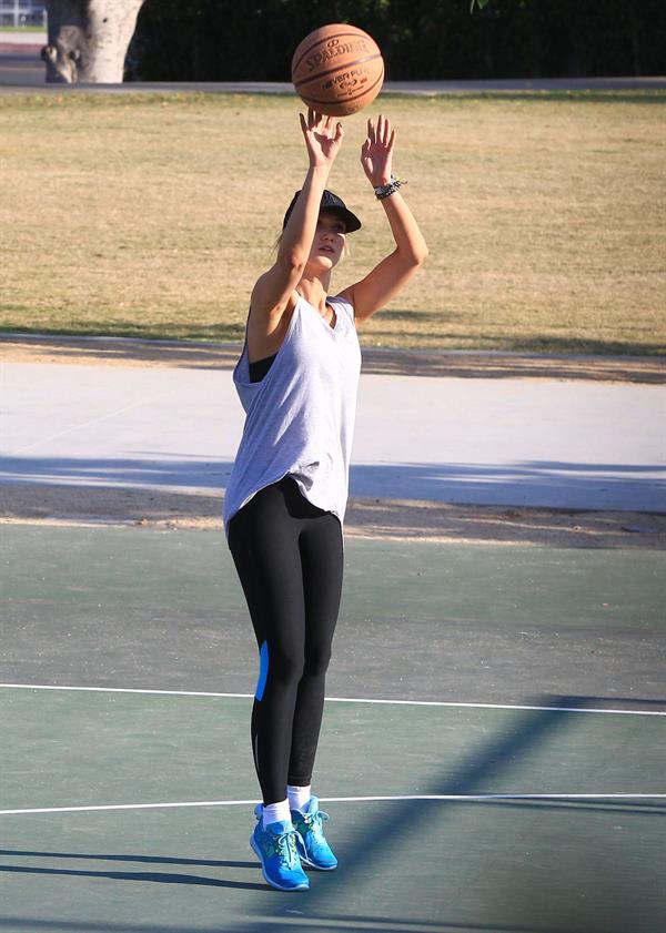 Delta Goodrem playing basketball with a friend in Los Angeles, California on November 3, 2013 