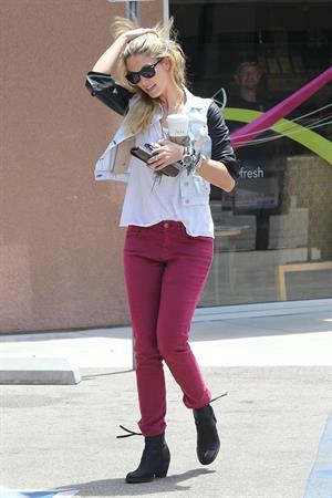 Delta Goodrem - Stopping to get a coffee on her way to work in Los Angeles, California - July 18, 2012