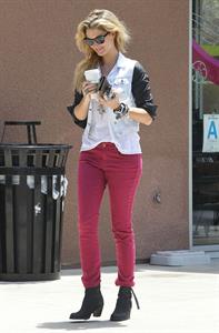 Delta Goodrem - Stopping to get a coffee on her way to work in Los Angeles, California - July 18, 2012