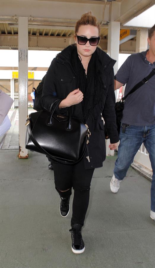 Demi Lovato - Leaves London Heathrow Airport in London (01.06.2013) 