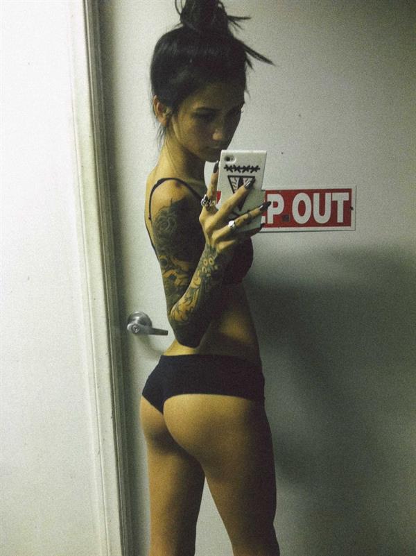 Jenah Yamamoto taking a selfie and - ass