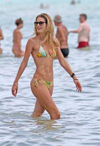 Doutzen Kroes bikini beach pictures in Miami August 16, 2012
