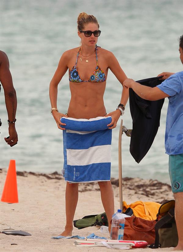Doutzen Kroes bikini candids on the beach in Miami, Florida Augusts 15, 2012