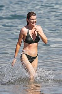Ellen Pompeo - Wearing a sexy wet bikini on a beach in Maui (June 6, 2012)