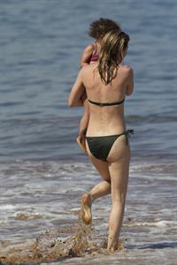 Ellen Pompeo - Wearing a sexy wet bikini on a beach in Maui (June 6, 2012)