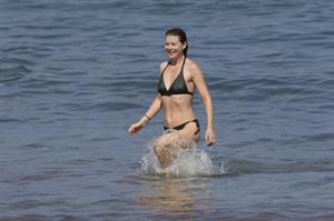 Ellen Pompeo - Wearing a sexy wet bikini on a beach in Maui (June 6, 2012)