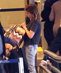 Emma Roberts departing on a flight at LAairport in Los Angeles, California on December 22, 2012 