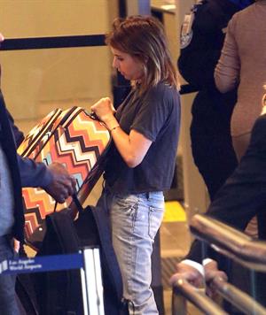 Emma Roberts departing on a flight at LAairport in Los Angeles, California on December 22, 2012 