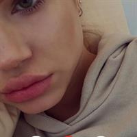 Meredith Mickelson taking a selfie